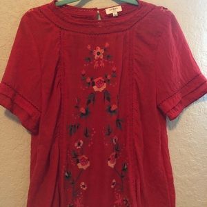 Red embroidered blouse